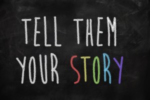 Tell them your story written on blackboard